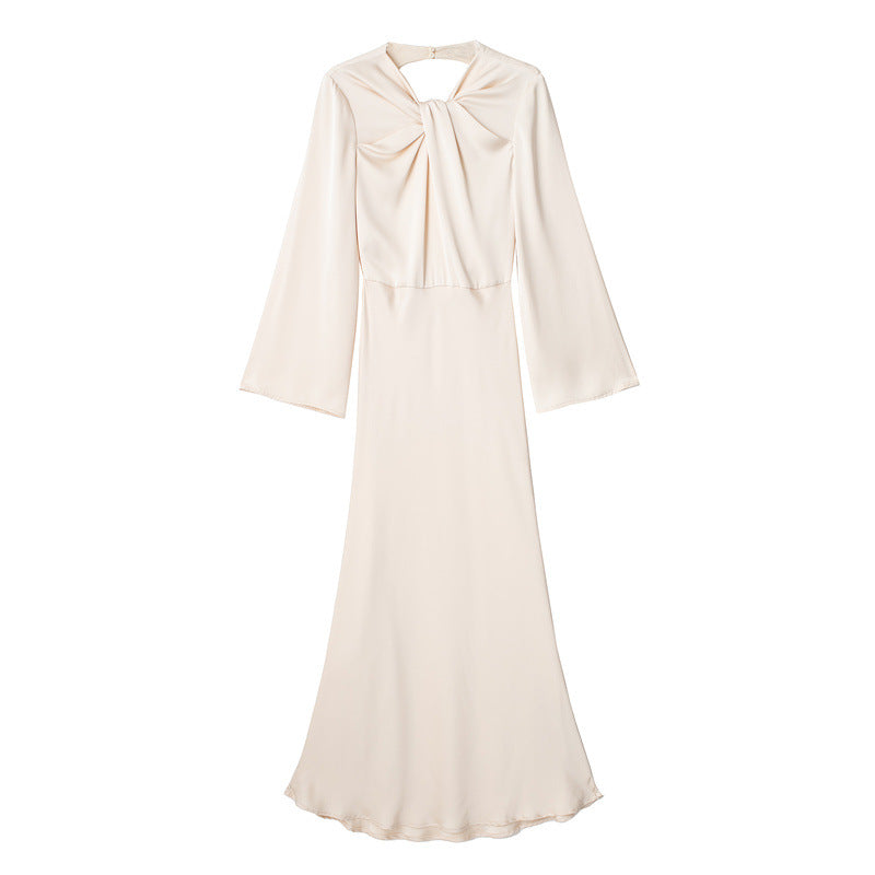 Backless long-sleeve maxi dress with sleek fitted silhouette