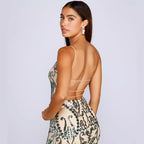 Women’s sequin dress with open back and crisscross spaghetti straps, green-and-cream pattern