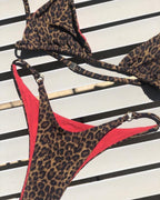 Leopard-print three-point bikini one-piece with red piping and braided tie straps