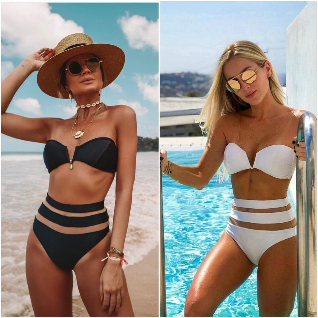 Black and white halterneck one-piece swimsuits with striped high-waist bands