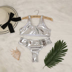 Silver metallic two-piece swim set with scoop bralette and high-waist bottoms