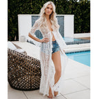 White lace kimono-style cover-up with elbow sleeves and lace panel design
