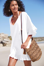 White slub cotton one-piece swimwear with V-neck and flared three-quarter sleeves