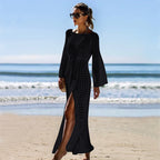 Black knit long-sleeve maxi dress with openwork pattern and side slit