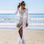 White knit long-sleeve maxi dress with eyelet-like openwork and front slit