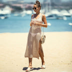 White hollow-out one-piece swimsuit with spaghetti straps, open mesh knit and side slit