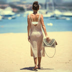 White hollow-out one-piece swimsuit, open mesh knit back with spaghetti straps and side slit