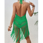 Green crochet halter cover-up with open-back straps and long fringe tassels