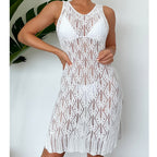 White sleeveless mid-length knit dress with scalloped trim and scoop neckline