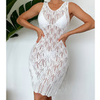 White sleeveless mid-length dress with decorative crochet lace pattern and scoop neck