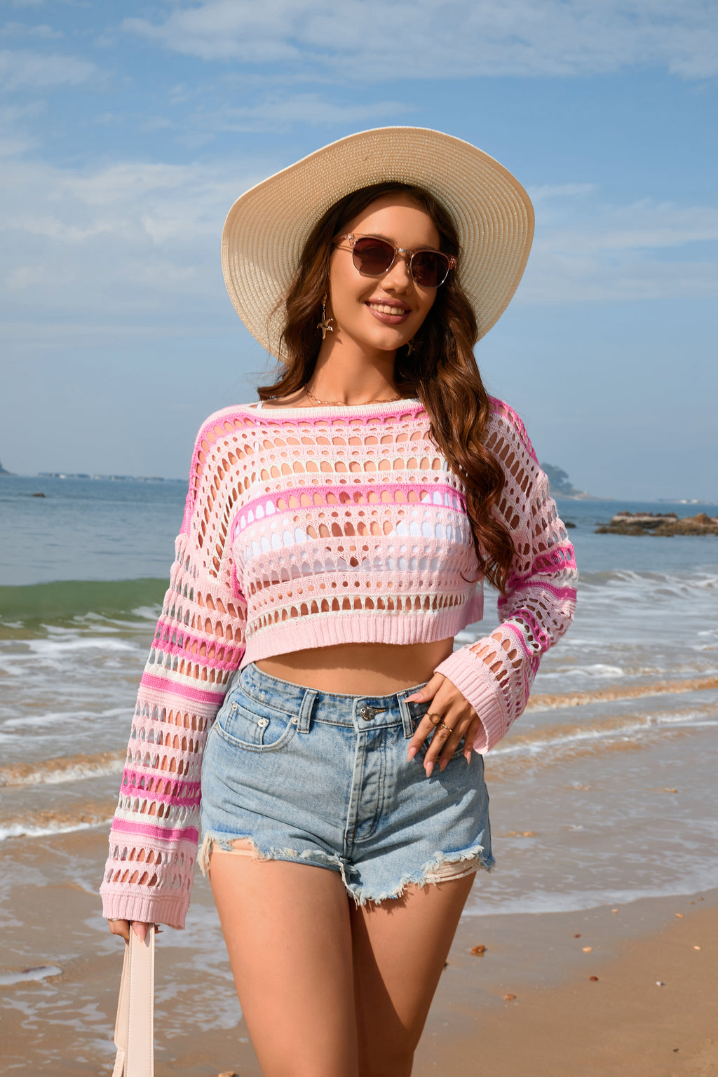 Women’s pink and white striped crochet crop sweater with wide sleeves