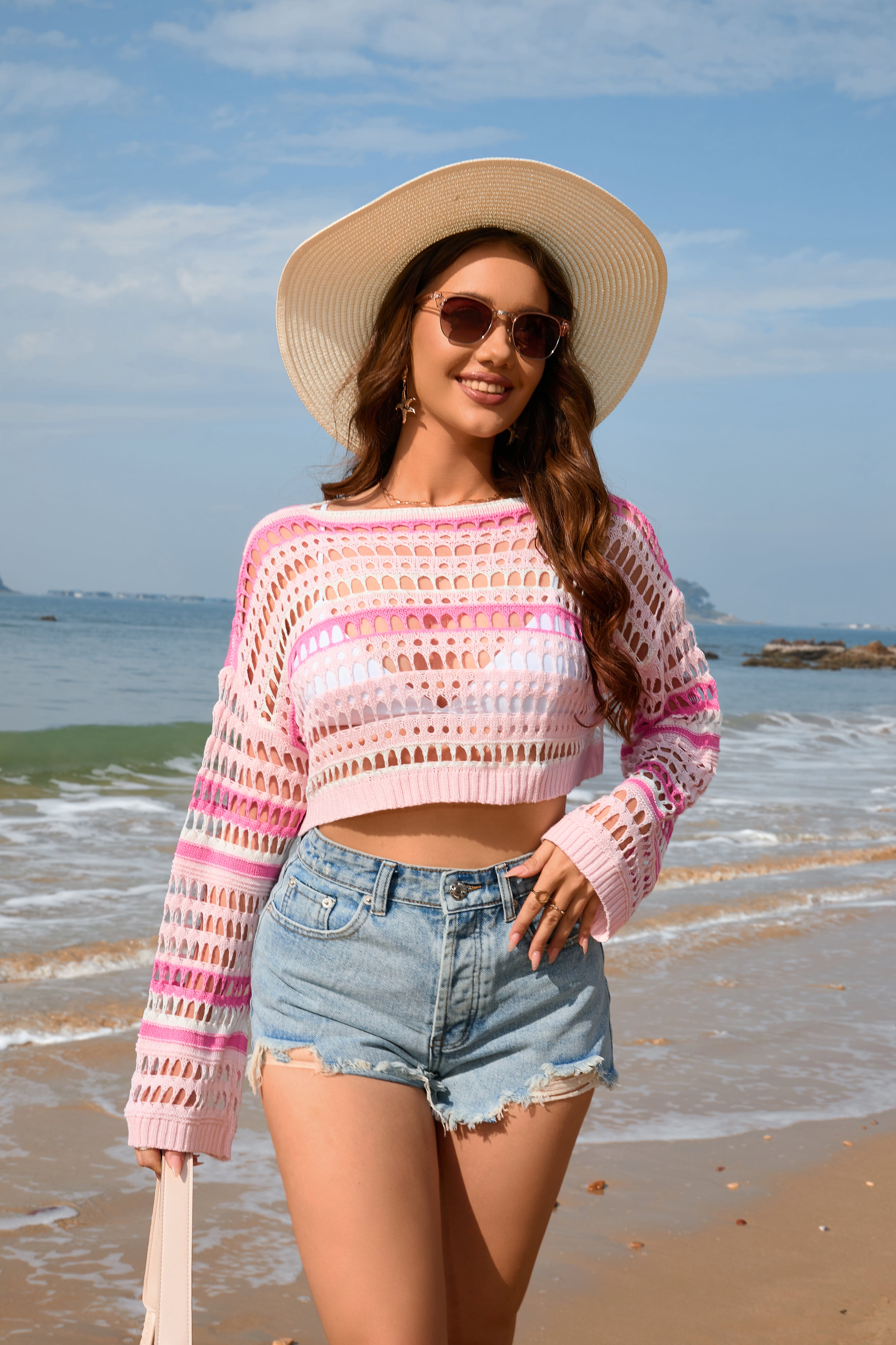 Women’s pink and white striped crochet crop sweater with wide sleeves