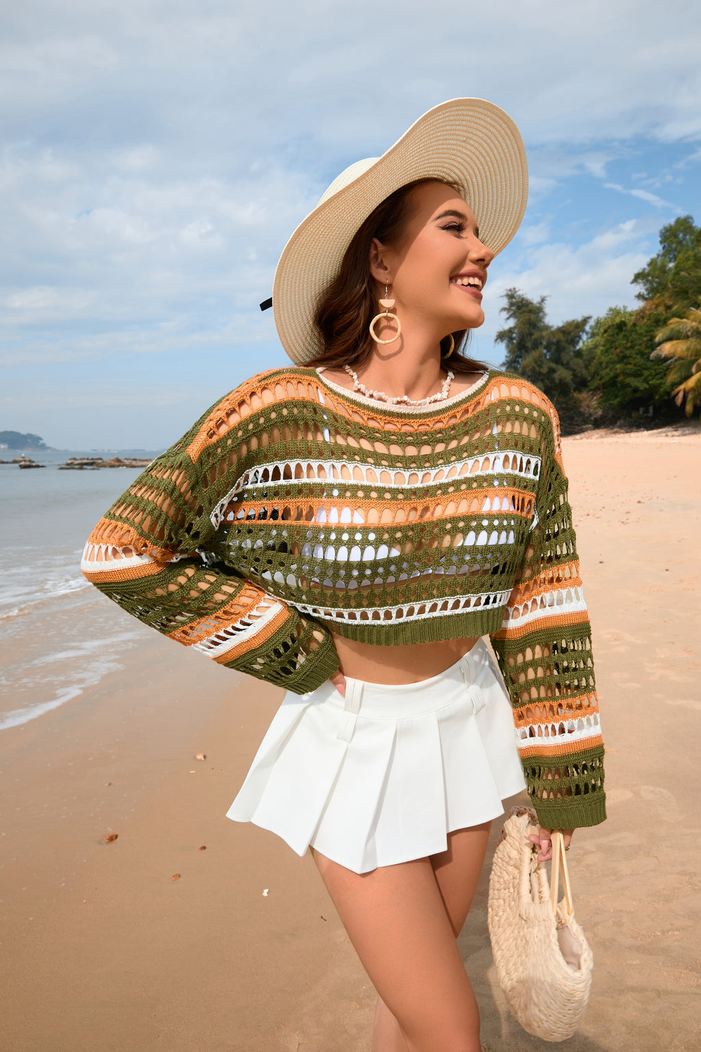 Women’s green and orange striped crochet crop sweater with wide sleeves