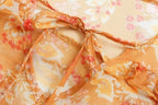 Women’s Orange Floral Ruffle Tie Neck Shirt