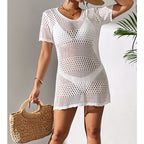 White cutout knit one-piece swimsuit, front three-quarter view, V-neck, mini length