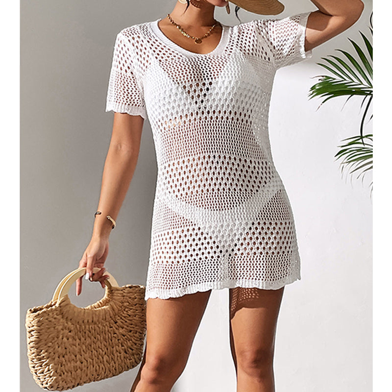 White cutout knit one-piece swimsuit, front three-quarter view, V-neck, mini length