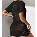 Black cutout knit one-piece swimsuit, open-knit back, short sleeves, mini length
