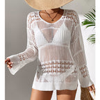 White crochet-knit pullover with V-neck and repeating openwork patterns