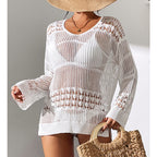 White hollow-out knit V-neck pullover with patterned yoke and ribbed cuffs