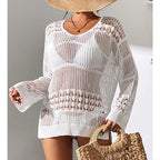 White openwork knit pullover sweater with V-neck, loose shoulders, ribbed hem