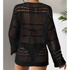 Black hollow-out knit pullover sweater with open back panel and long sleeves