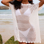 White openwork crochet pullover tunic with crew neck and scalloped hem, short sleeves