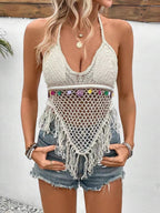 Women's white halter crochet top with openwork pattern and long tassel accents
