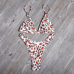 Leopard print bikini set: V-neck triangle top and Brazilian thong-style bottoms
