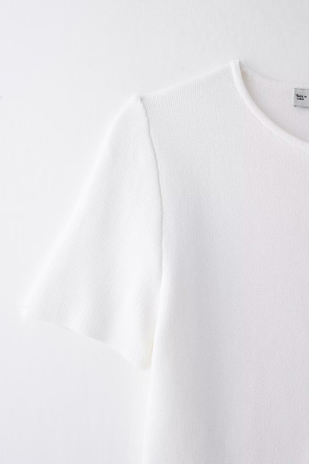 Women’s White V Neck Button Knit Top