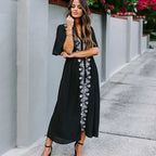 Black rayon cover-up swimwear with lace-up embroidered front detail and cuffed sleeves