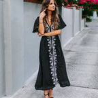 Black rayon cover-up swimwear with embroidered vertical front panel and wide sleeves