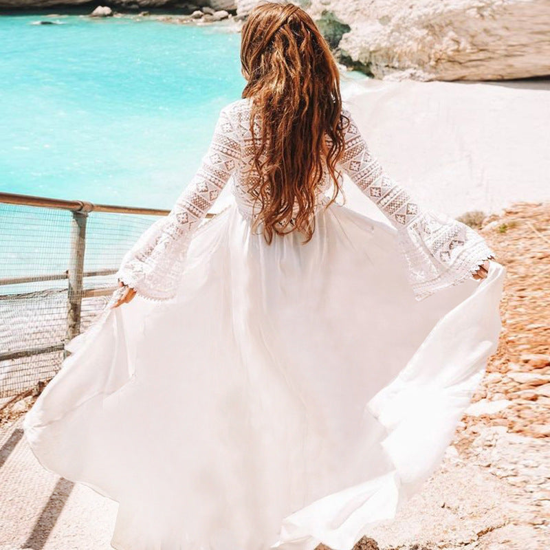 White rayon cover-up swimwear, back view with flowing long sleeves and wide skirt