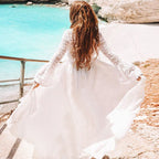 White rayon cover-up swimwear, back view with flowing long sleeves and wide skirt
