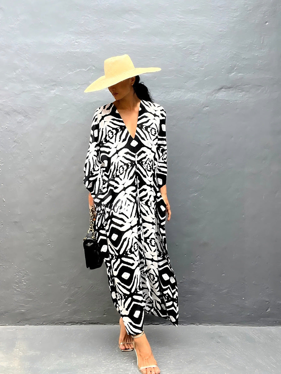 Rayon drawstring maxi dress in black and white animal print, V-neck front