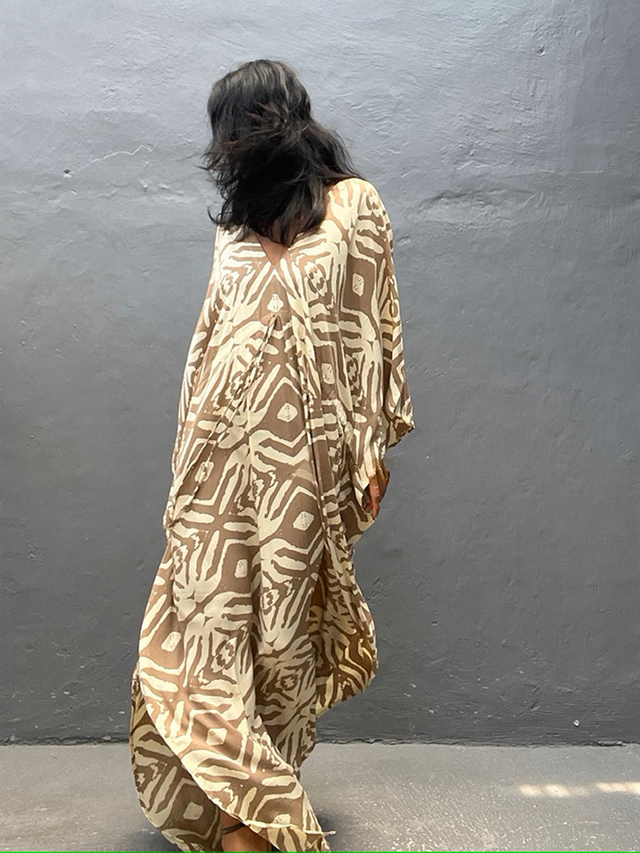 Rayon drawstring maxi dress in tan with white animal print, back view with sleeve detail