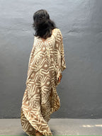 Rayon drawstring maxi dress in tan with white animal print, back view