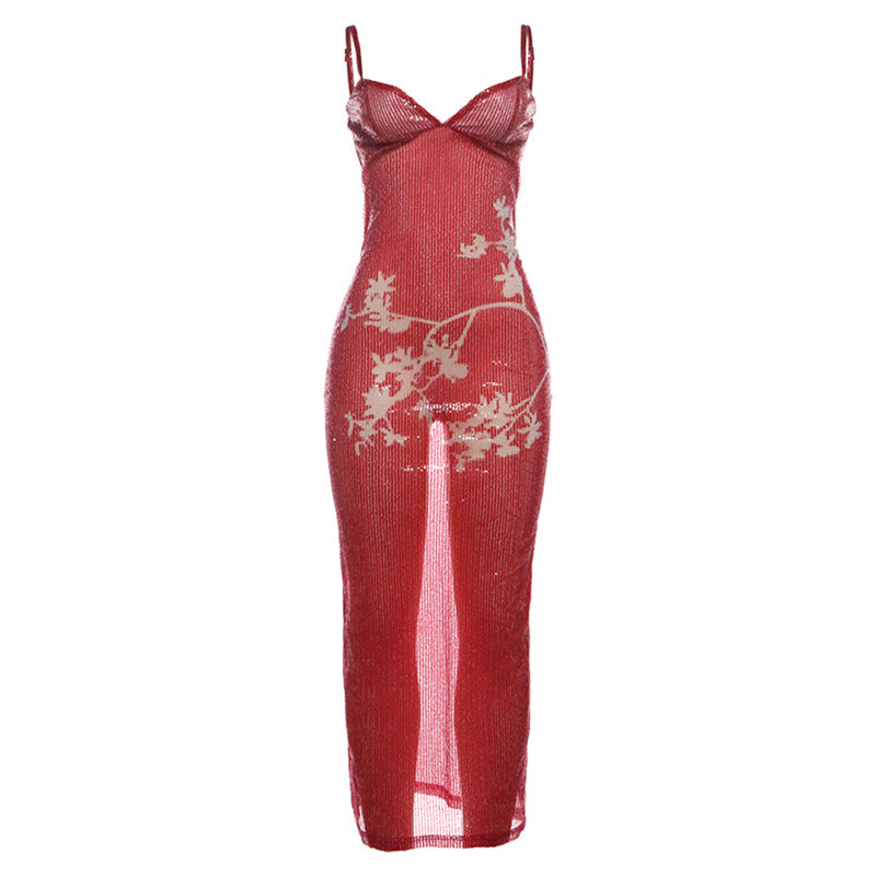 Front view: red sequin maxi slip dress with V-neck, thin straps, white reindeer pattern