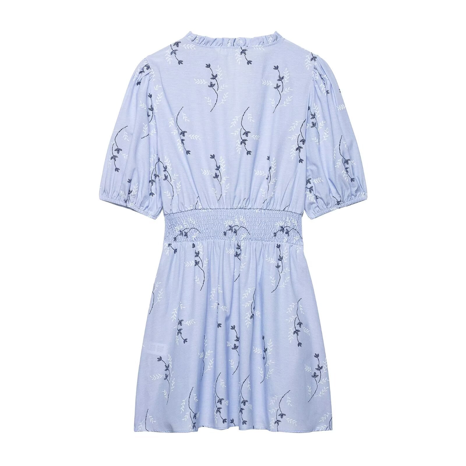 Light blue spring dress with short puff sleeves, gathered back, smocked waist, and navy animal print