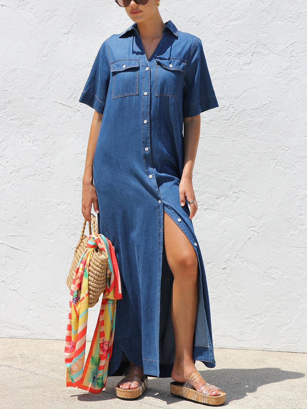 Navy denim maxi dress with collared button-front, short sleeves, side slit