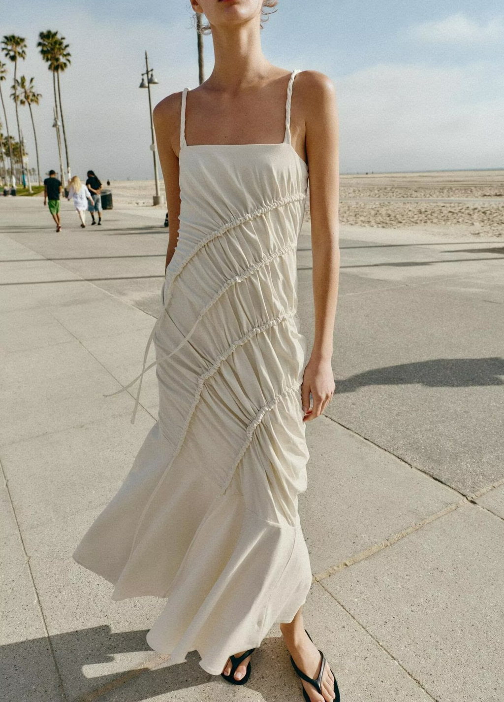 Maxi pleated dress with spaghetti straps and diagonal ruched detailing, off-white