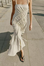 Maxi pleated dress with ruched side panel and spaghetti straps, off-white