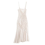 Off-white maxi pleated dress with spaghetti straps and ruched diagonal front panel