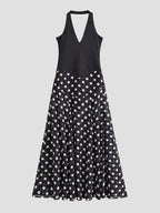 Black sleeveless V-neck midi dress with white polka dot gathered skirt