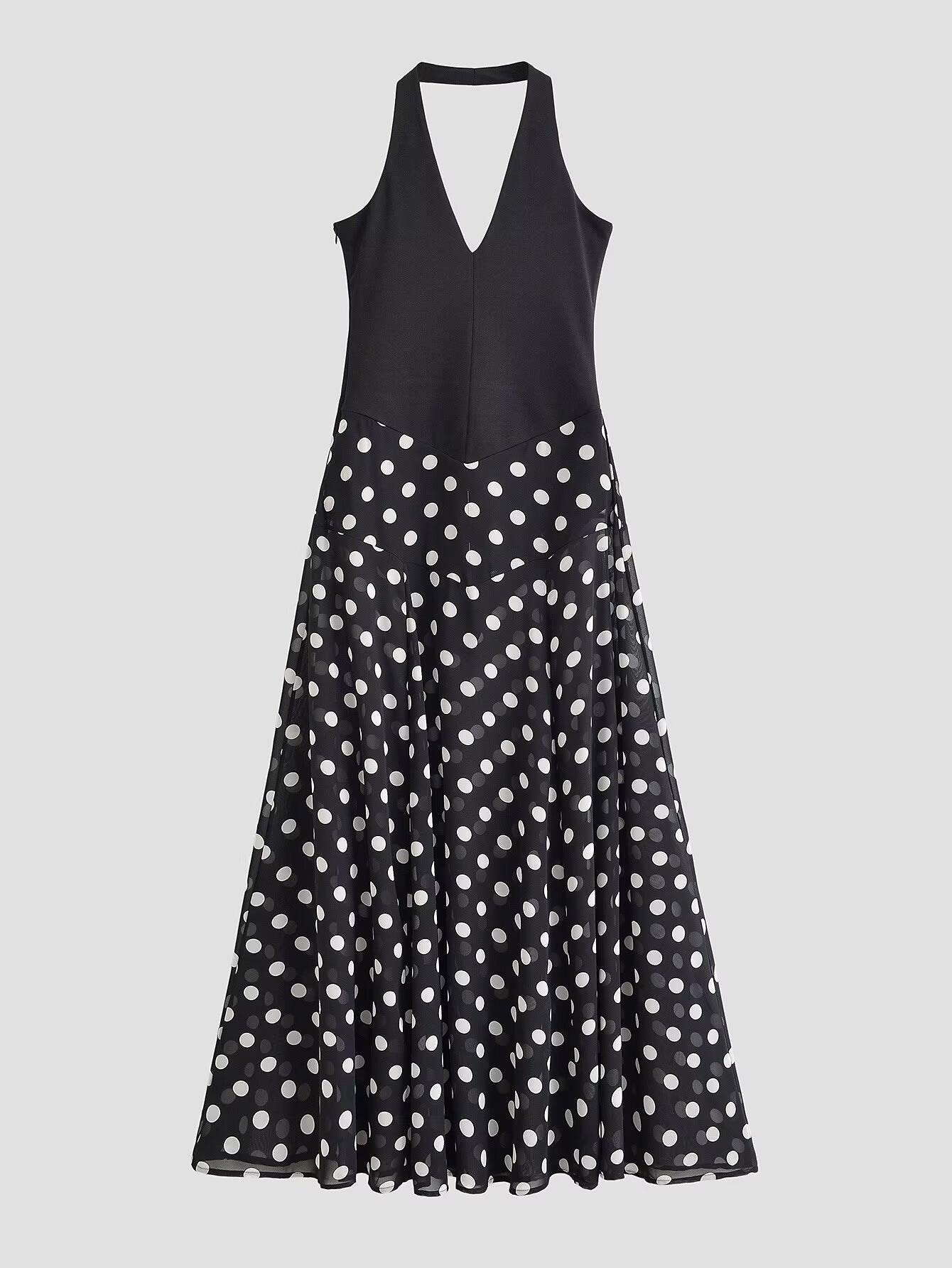 Black sleeveless V-neck midi dress with white polka dot gathered skirt