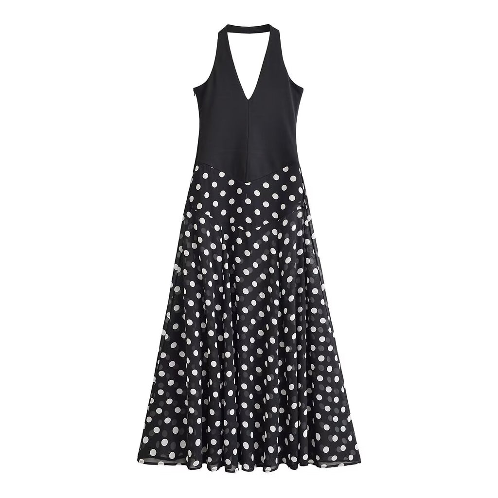 Black sleeveless V-neck midi dress with white polka dot flare skirt