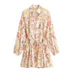 Floral summer dress with long sleeves, button-front, and gathered waist in pastel multi