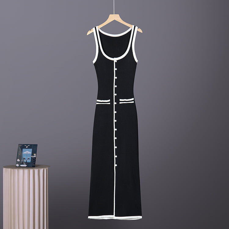 Sleeveless knit maxi dress in black with white trim, striped cuffs, and button front