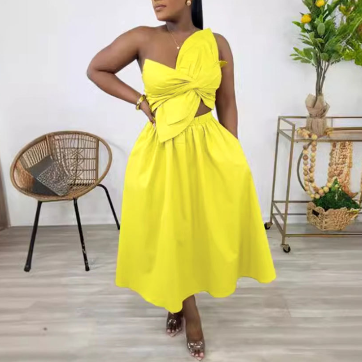 Yellow sleeveless midi dress with draped knot at bodice and full skirt
