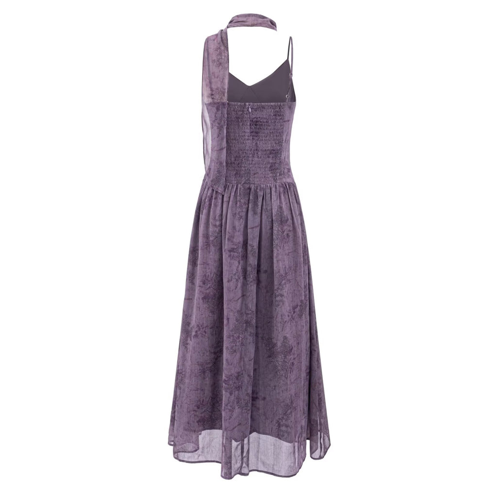 Purple maxi summer dress with spaghetti straps and open back, gathered waist, flared skirt.