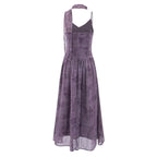 Purple maxi summer dress with spaghetti straps and open back, gathered waist, flared skirt.